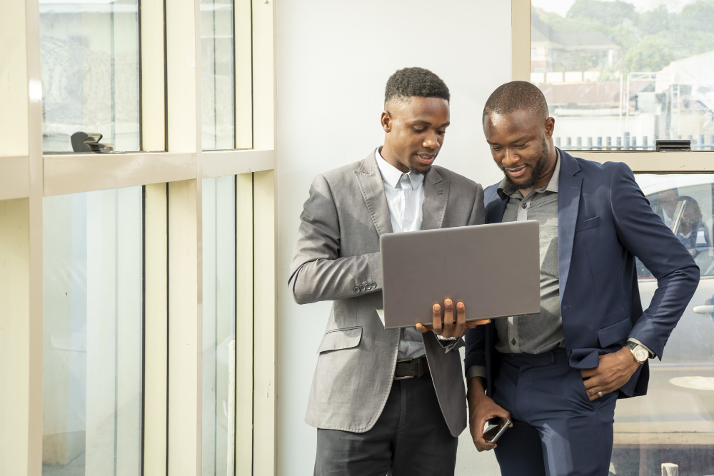 Two partners reviewing work together