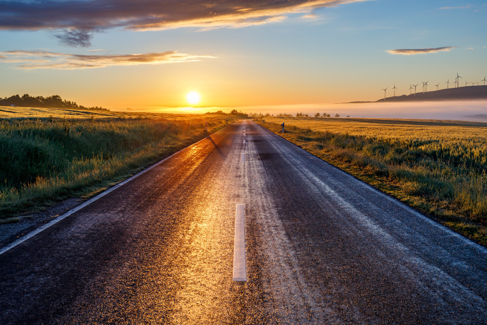 A road stretching toward the sunrise